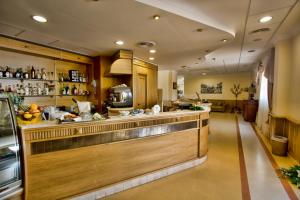 Nápoje v ubytování Uliveto Principessa Resort