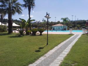 Bazén v ubytování Uliveto Principessa Resort nebo v jeho okolí