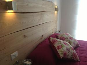 Llit o llits en una habitació de Corte Del Gallo
