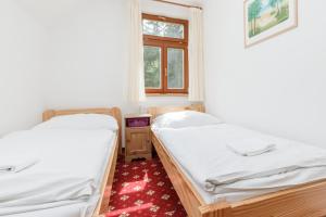 Rúm í herbergi á Farma Hory