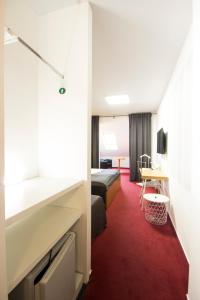 TV a/nebo společenská místnost v ubytování Hotel Maroli Mikulov