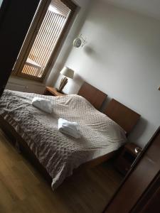 Ліжко або ліжка в номері Olympic Park Apartament A403