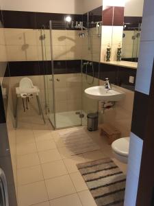 Koupelna v ubytování Olympic Park A403 Kołobrzeg