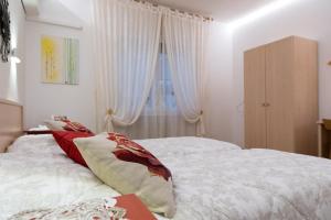Postel nebo postele na pokoji v ubytování Bed & Breakfast Delle Rose
