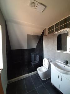 Koupelna v ubytování N'konak Guesthouse