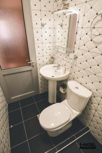 Kylpyhuone majoituspaikassa Hotel Brahimi