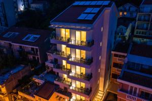 an overhead view of a building at night at Hotel Bono in Budva