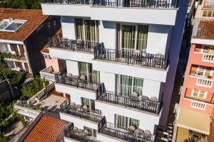 an aerial view of a building with balconies at Hotel Bono in Budva