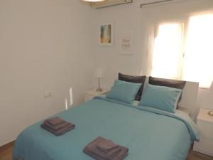 Posteľ alebo postele v izbe v ubytovaní Ole Playa 6A, Beach Front - A pie de Playa, Sea Views - Vistas al Mar, Parking, Puerto Marina