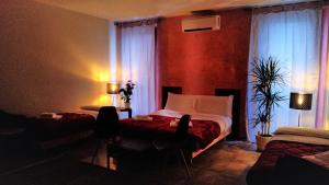 Posedenie v ubytovaní Marconi Rooms Loggia delle Erbe