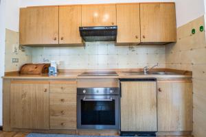 Kuchyň nebo kuchyňský kout v ubytování Casa Elisa Apartments