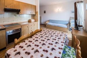 Postel nebo postele na pokoji v ubytování Casa Elisa Apartments