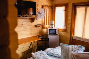 Η κουζίνα ή μικρή κουζίνα στο Casute Sebastian Baile Figa