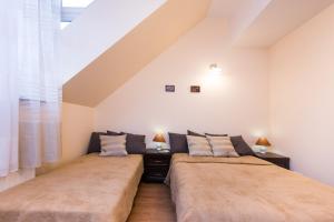 Posteľ alebo postele v izbe v ubytovaní Vanilla Apartment 1