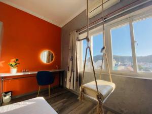 Postel nebo postele na pokoji v ubytování Dylan Hotel