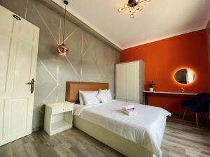 Postel nebo postele na pokoji v ubytování Dylan Hotel