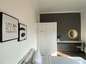 Postel nebo postele na pokoji v ubytování Dylan Hotel