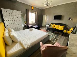 TV a/nebo společenská místnost v ubytování Dylan Hotel