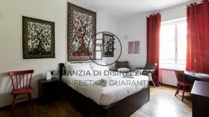 Łóżko lub łóżka w pokoju w obiekcie Italianway - Cenisio 7