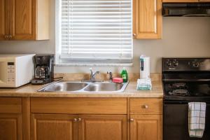 A kitchen or kitchenette at Riptide Oceanfront Hotel