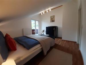 Postel nebo postele na pokoji v ubytování Haus Putzas Appartment