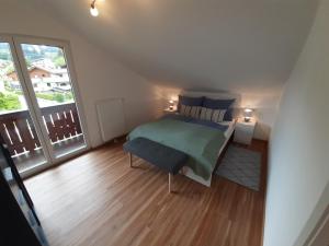 Postel nebo postele na pokoji v ubytování Haus Putzas Appartment