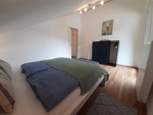 Postel nebo postele na pokoji v ubytování Haus Putzas Appartment