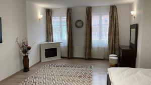 Ένα ή περισσότερα κρεβάτια σε δωμάτιο στο CentralHome Ap1