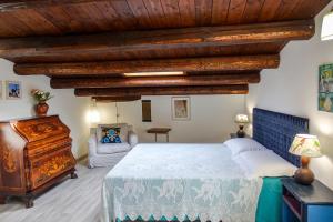 Ein Bett oder Betten in einem Zimmer der Unterkunft Villa Ananda homestay & yoga retreat