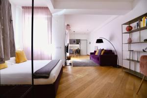 Posteľ alebo postele v izbe v ubytovaní Palazzina B - Contemporary Studio