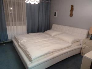 Кровать или кровати в номере Haus Fabro