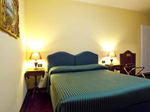 Postel nebo postele na pokoji v ubytování Relax Style House Central Rooms