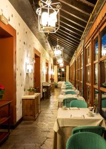 a row of tables lined up in a restaurant at Parador de La Gomera in San Sebastián de la Gomera