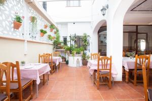 Un restaurant sau alt loc unde se poate mânca la Hostal El Gallo