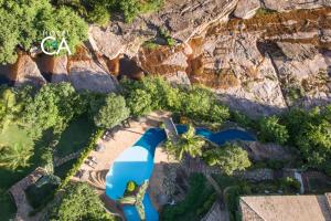 A piscina localizada em Hotel Canto das Águas - Roteiro de Charme ou nos arredores