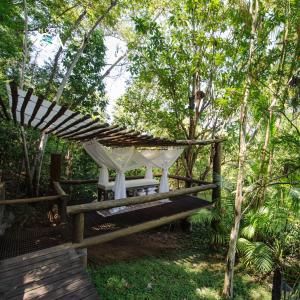 Um jardim em Hotel Canto das Águas - Roteiro de Charme