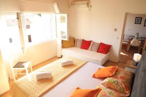 Cama ou camas em um quarto em APARTMANI SARLIJA