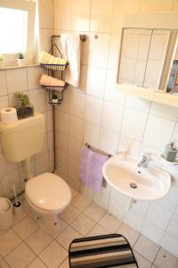 Um banheiro em APARTMANI SARLIJA