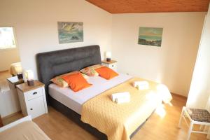 Cama ou camas em um quarto em APARTMANI SARLIJA