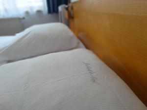 
Ein Bett oder Betten in einem Zimmer der Unterkunft Jakoberhof
