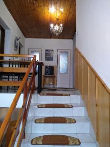 Televízia a/alebo spoločenská miestnosť v ubytovaní Vysoké Tatry Gerlaška