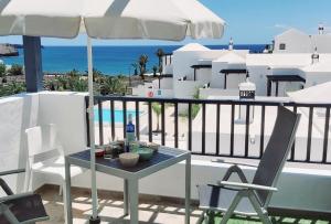 Balkón nebo terasa v ubytování Casa Mykonos 1° linea de mar en Playa Blanca