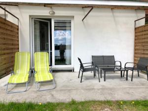 Patio alebo iná vonkajšia časť ubytovania Gościniec Rospuda 1