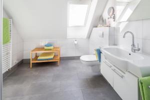 Koupelna v ubytování Haus an den Dünen