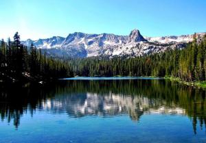 a view of a lake with mountains in the background at Discovery 4 #128, Loft in Mammoth Lakes