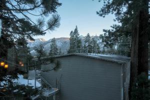 a roof of a house with snow on it at Mountainback #52, Loft, Corner in Mammoth Lakes
