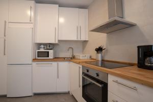 Kuchnia lub aneks kuchenny w obiekcie Bilbao High Apartment