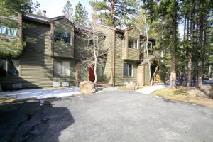 a house with a driveway in front of it at Forest Creek #3, Pet accepted in Mammoth Lakes