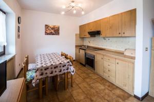 Kuchyň nebo kuchyňský kout v ubytování Casa Elisa Apartments