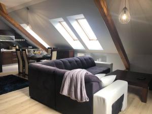 Khu vực ghế ngồi tại Apartament Miętowa Sowa